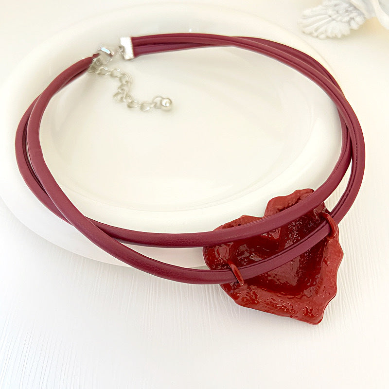 HEART ON LEATHER NECKLACE