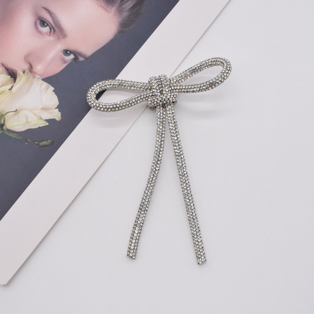 RHINESTONE BOW BROOCH