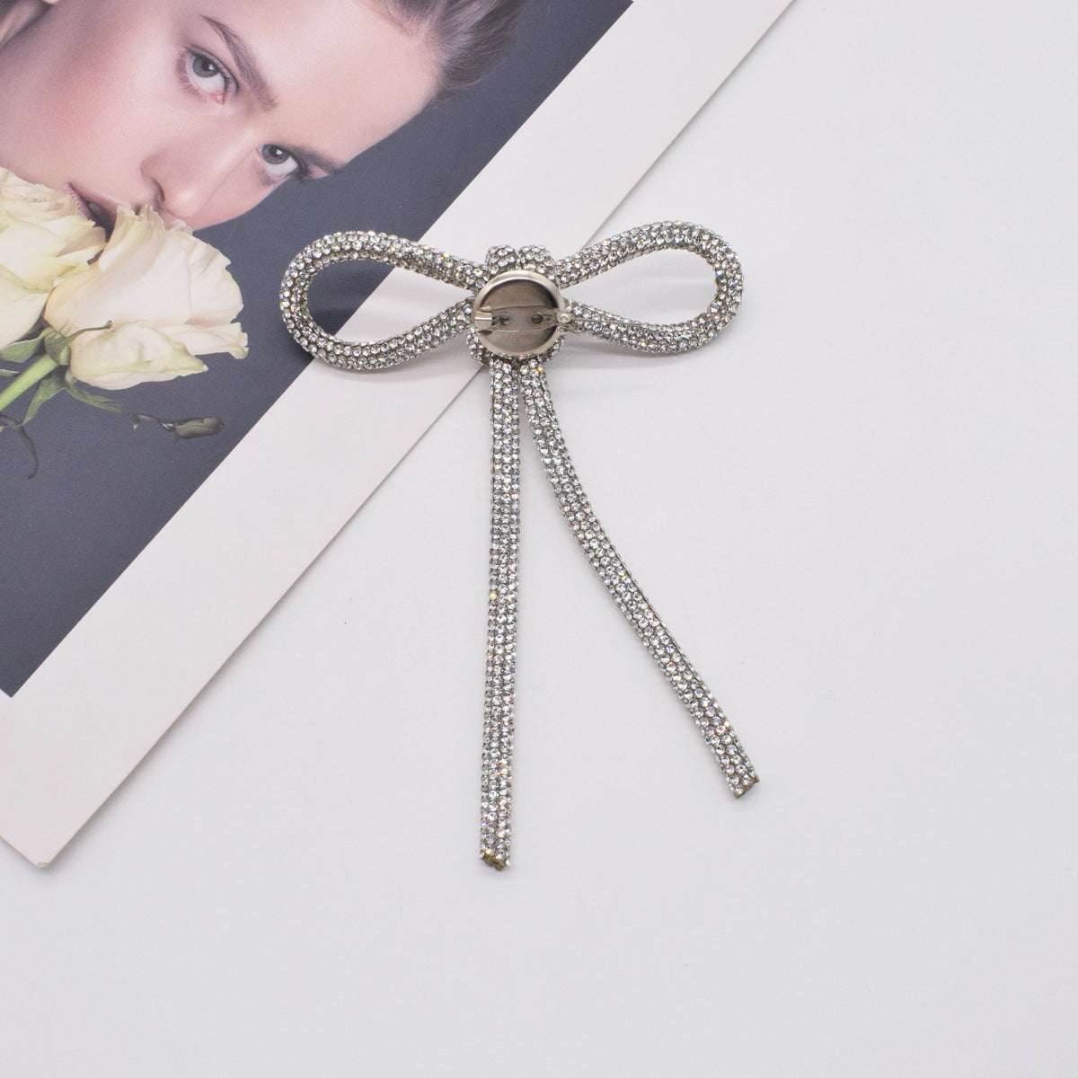 RHINESTONE BOW BROOCH